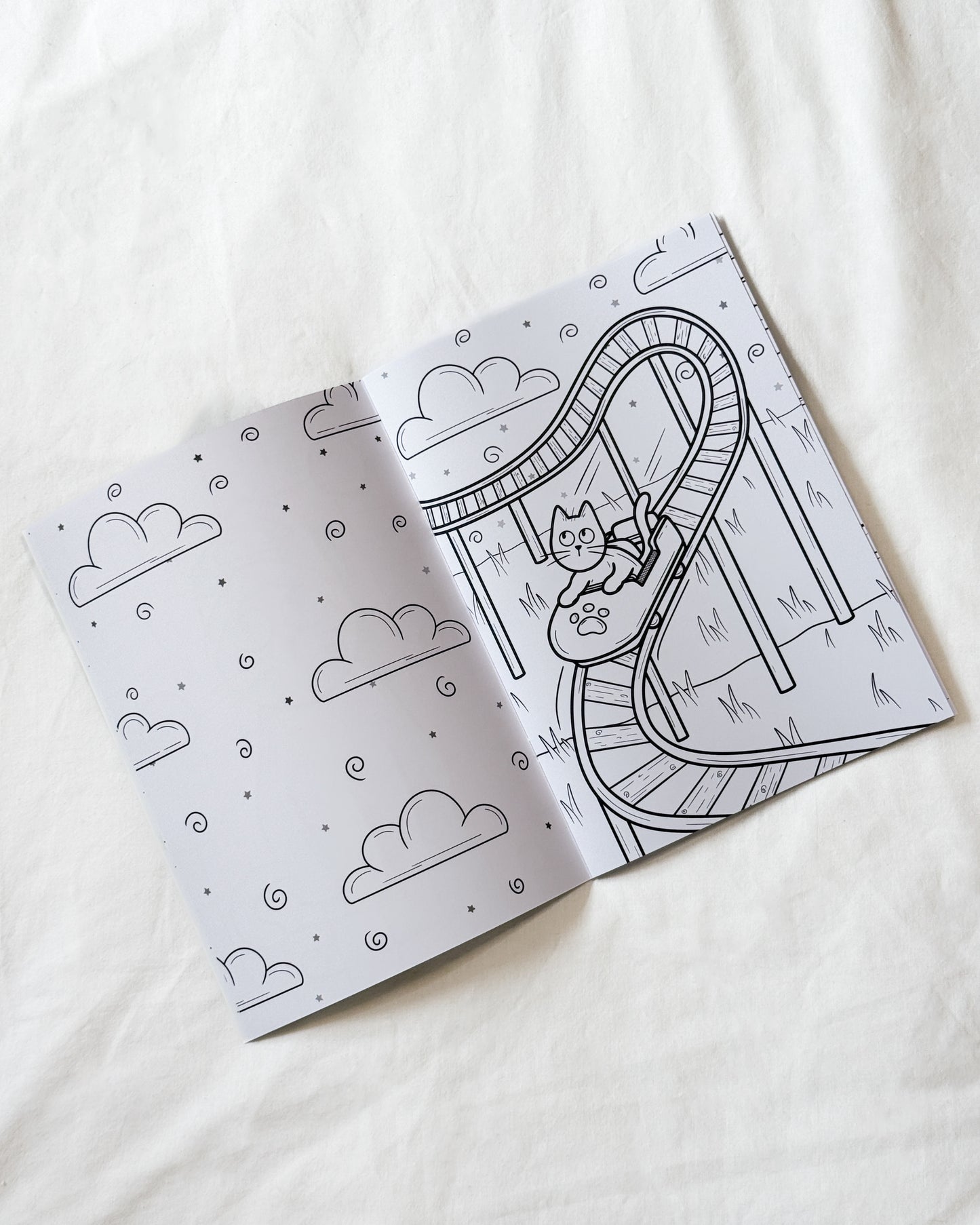 THE CURIOUS CAT COLOURING BOOK
