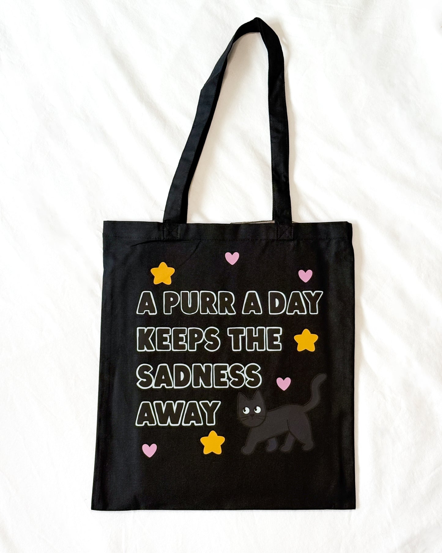 A PURR A DAY KEEPS THE SADNESS AWAY BLACK CAT TOTE BAG