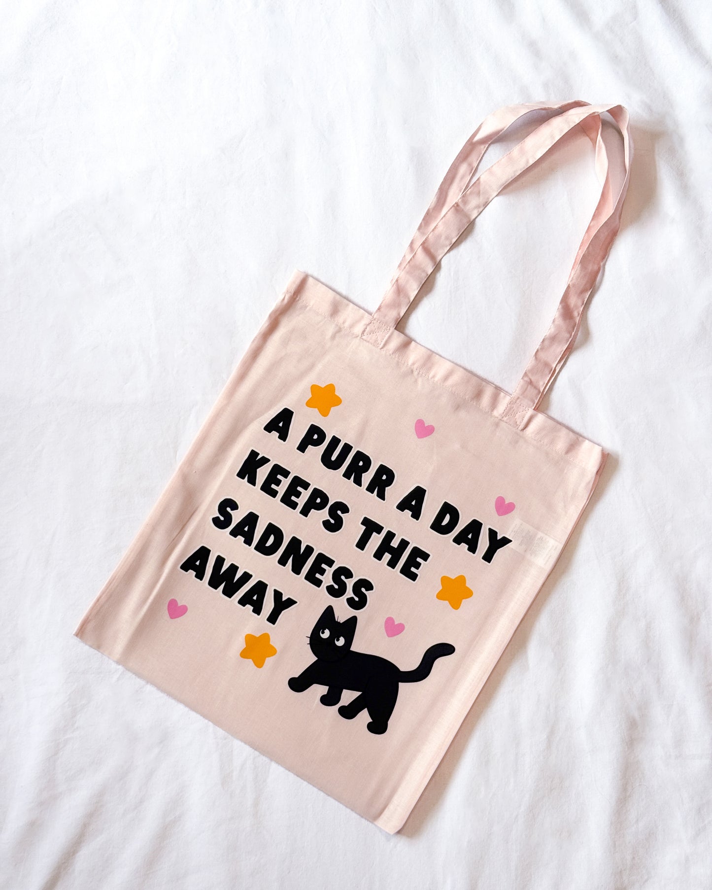 A PURR A DAY KEEPS THE SADNESS AWAY BLACK CAT TOTE BAG