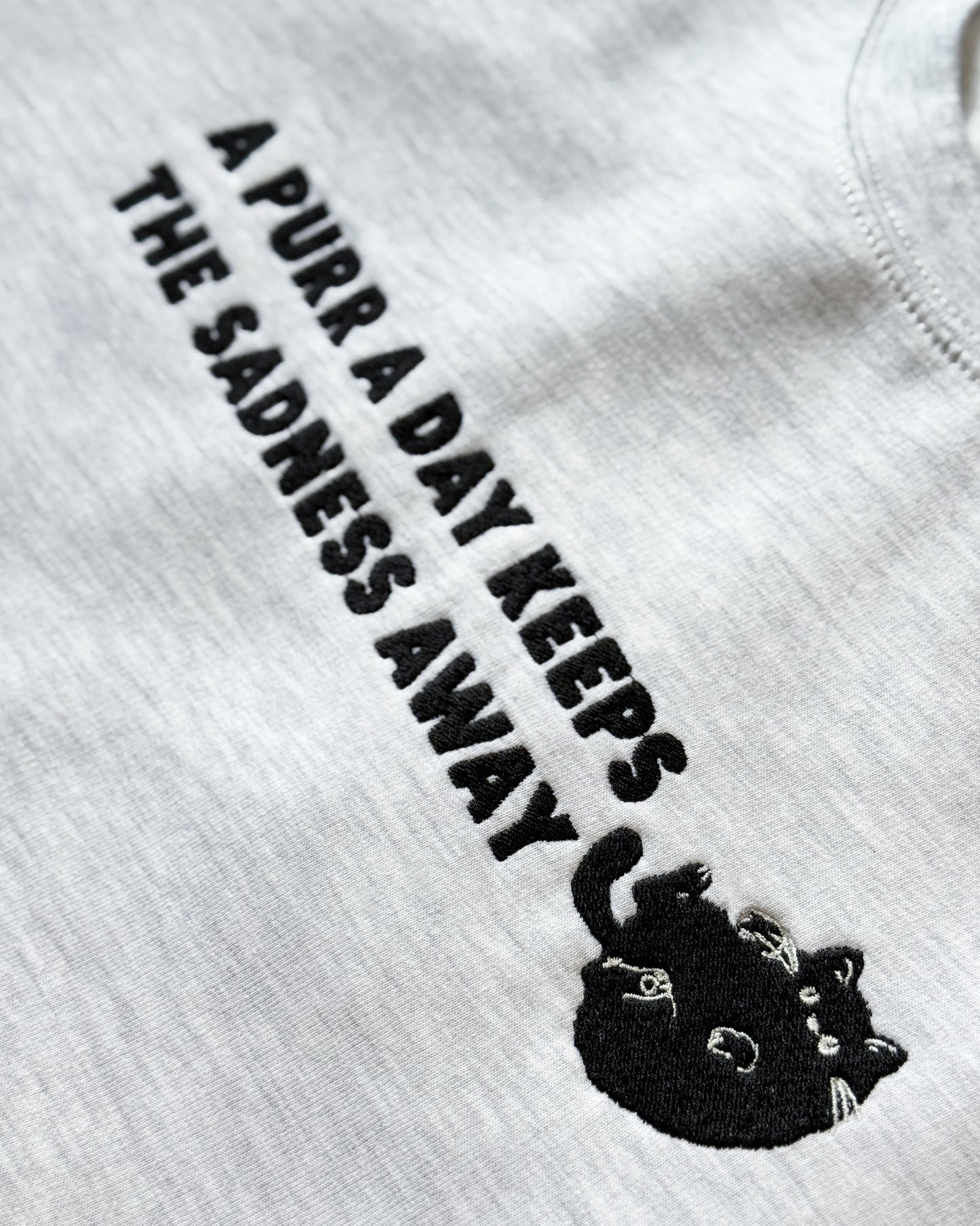 A PURR A DAY KEEPS THE SADNESS AWAY BLACK CAT EMBROIDERED SWEATSHIRT