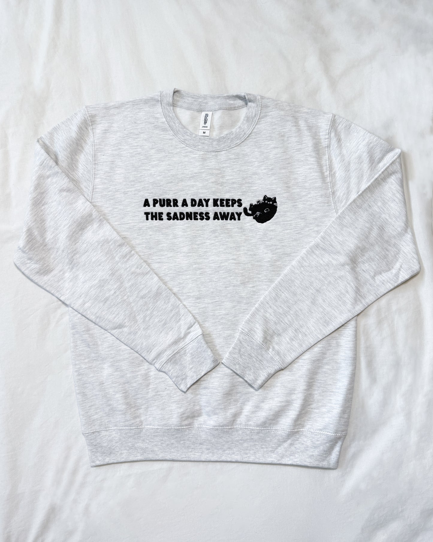A PURR A DAY KEEPS THE SADNESS AWAY BLACK CAT EMBROIDERED SWEATSHIRT