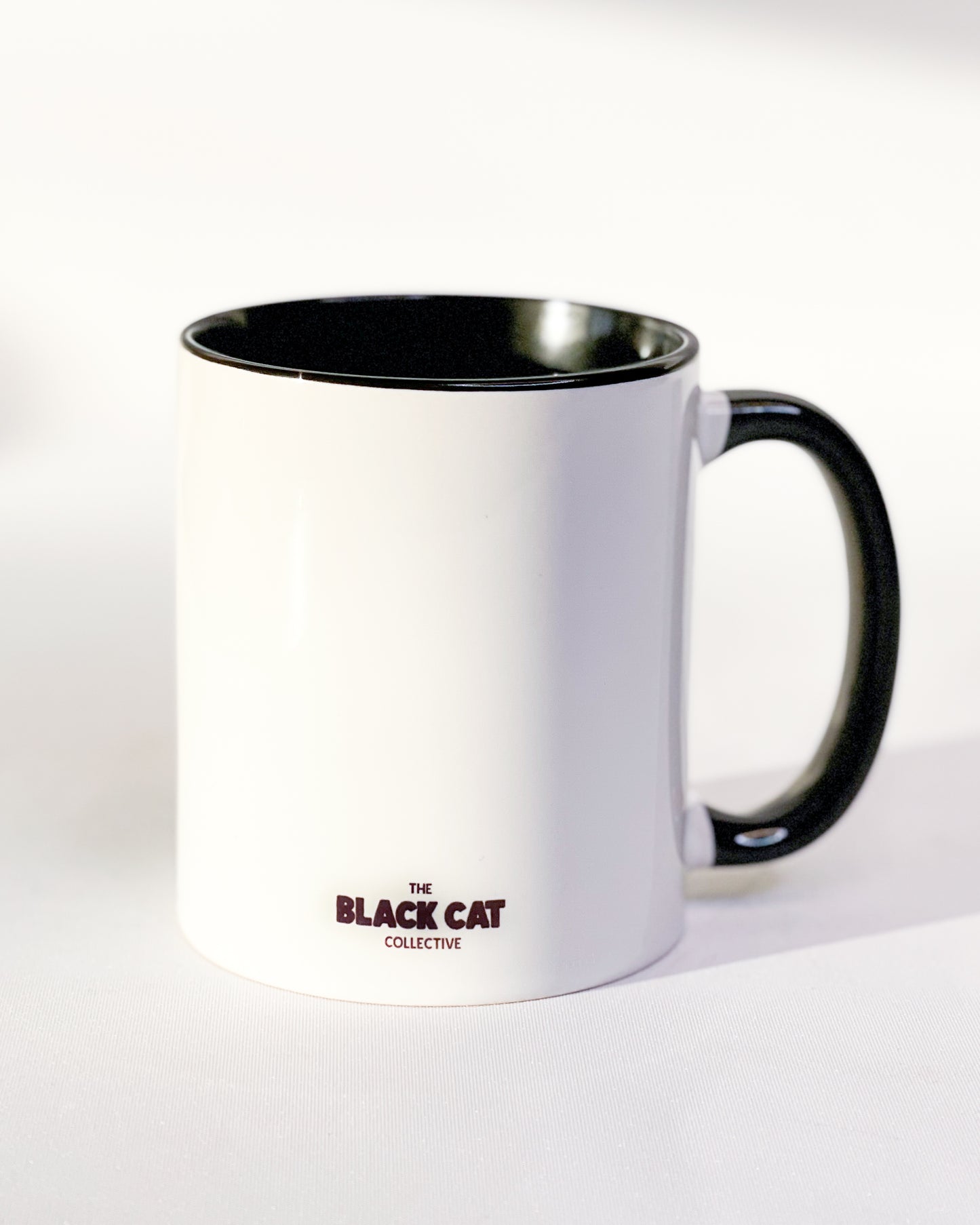 THE BLACK CAT COLLECTIVE LOGO MUG