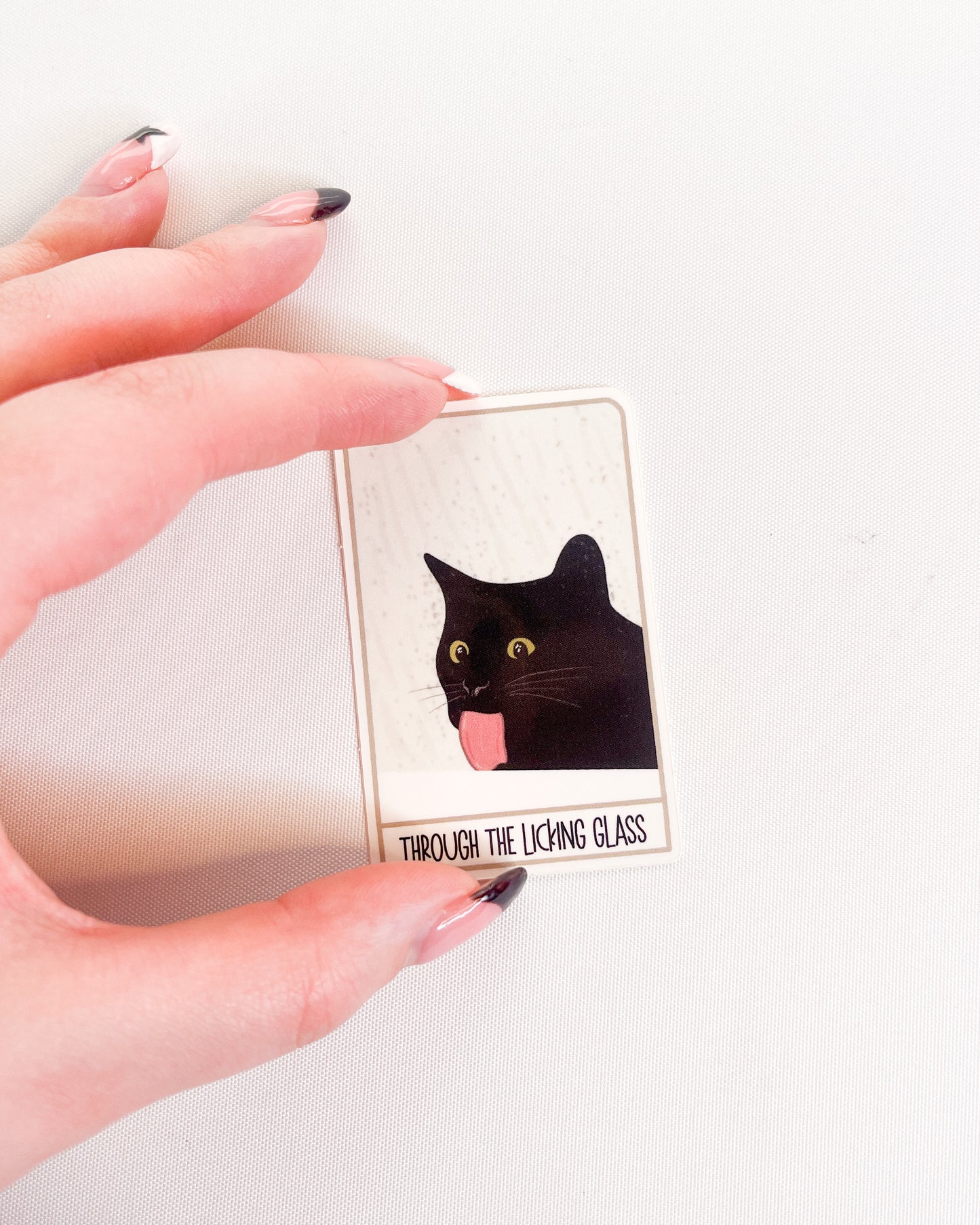 BLACK CAT MEME THROUGH THE LICKING GLASS GLOSSY VINYL STICKER