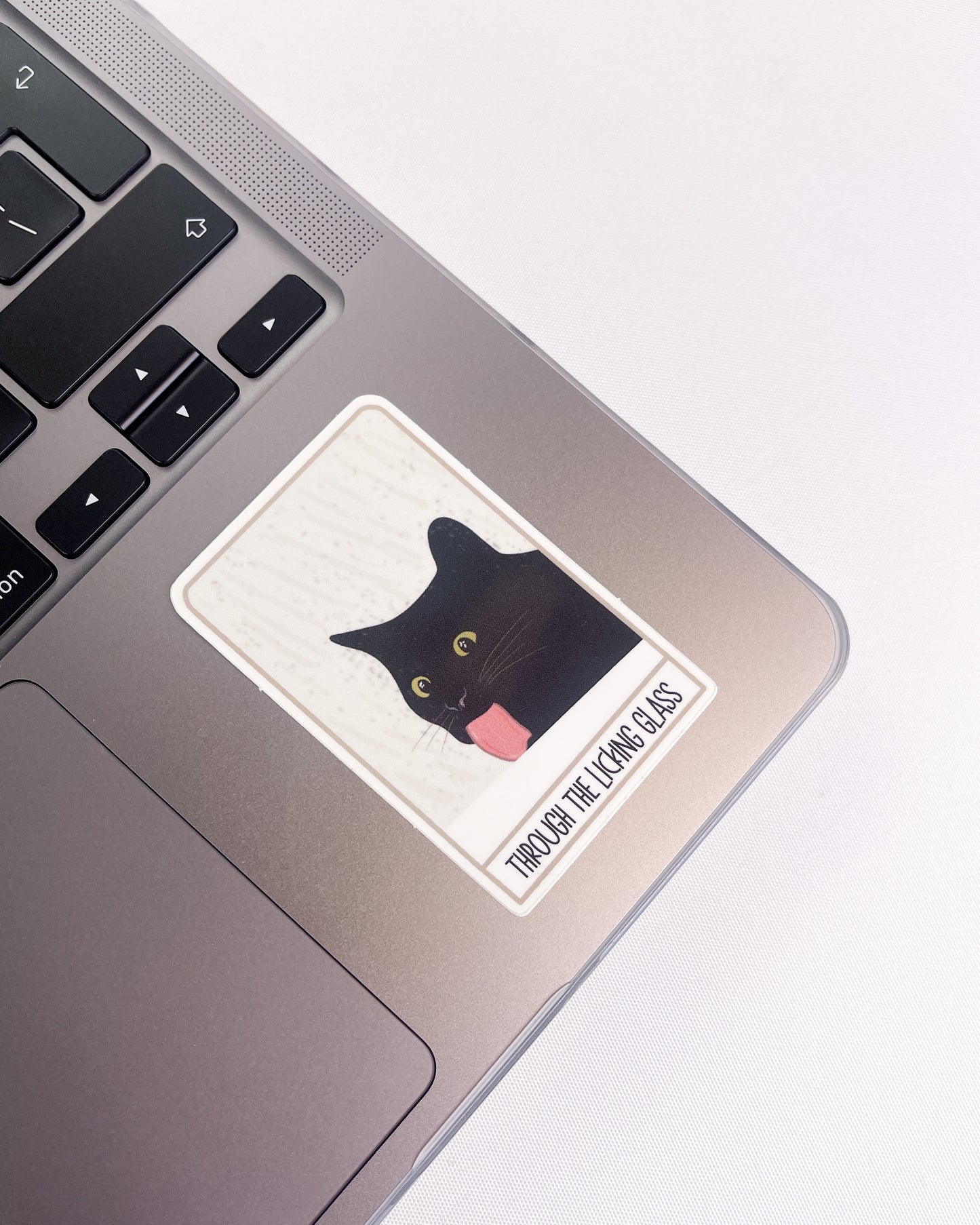 BLACK CAT MEME THROUGH THE LICKING GLASS GLOSSY VINYL STICKER